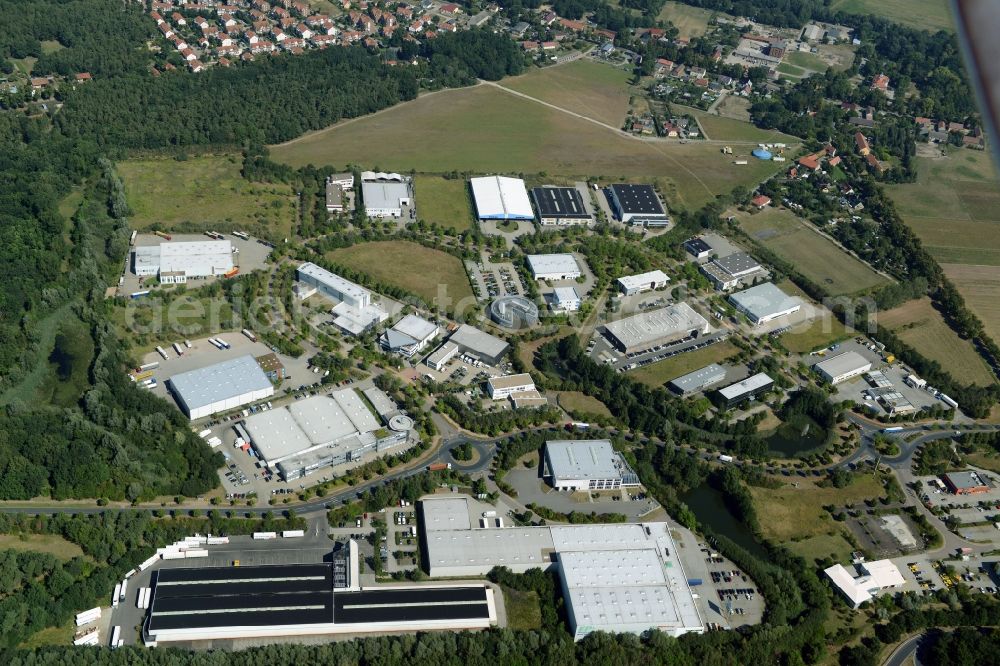 Aerial photograph Ludwigsfelde - Industrial estate and company settlement in at the motorway exit Genshagen in the state of Brandenburg. The area is part of the large Brandenburg Park complex