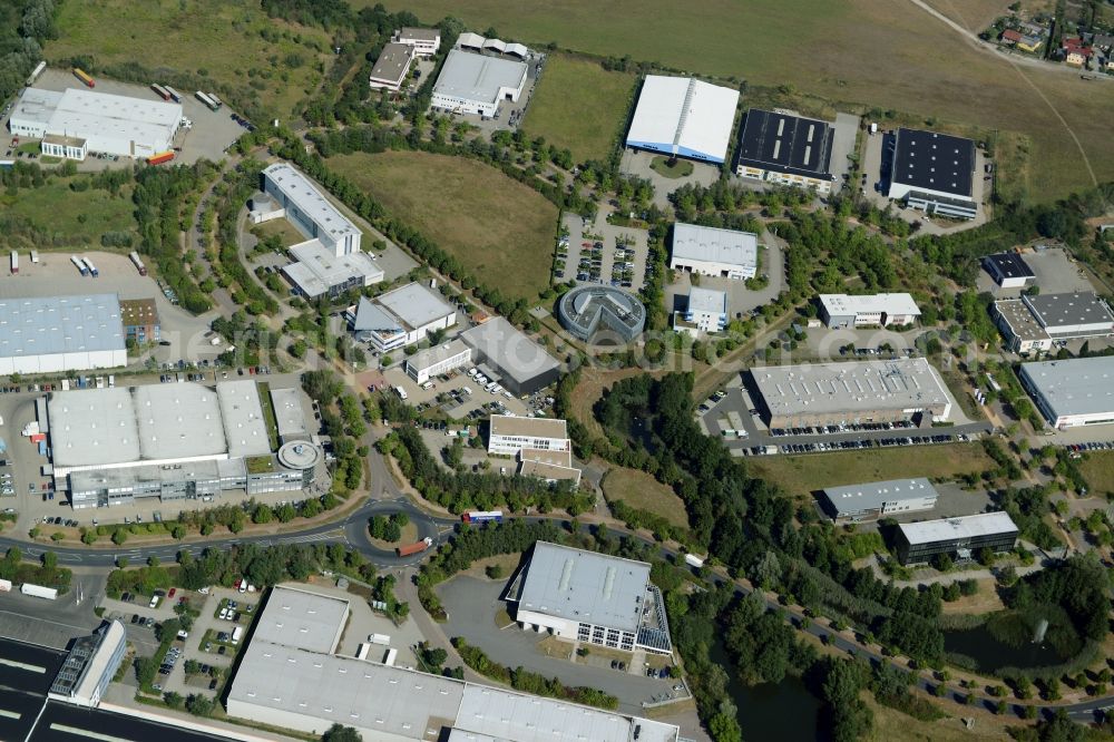 Ludwigsfelde from the bird's eye view: Industrial estate and company settlement in at the motorway exit Genshagen in the state of Brandenburg. The area is part of the large Brandenburg Park complex