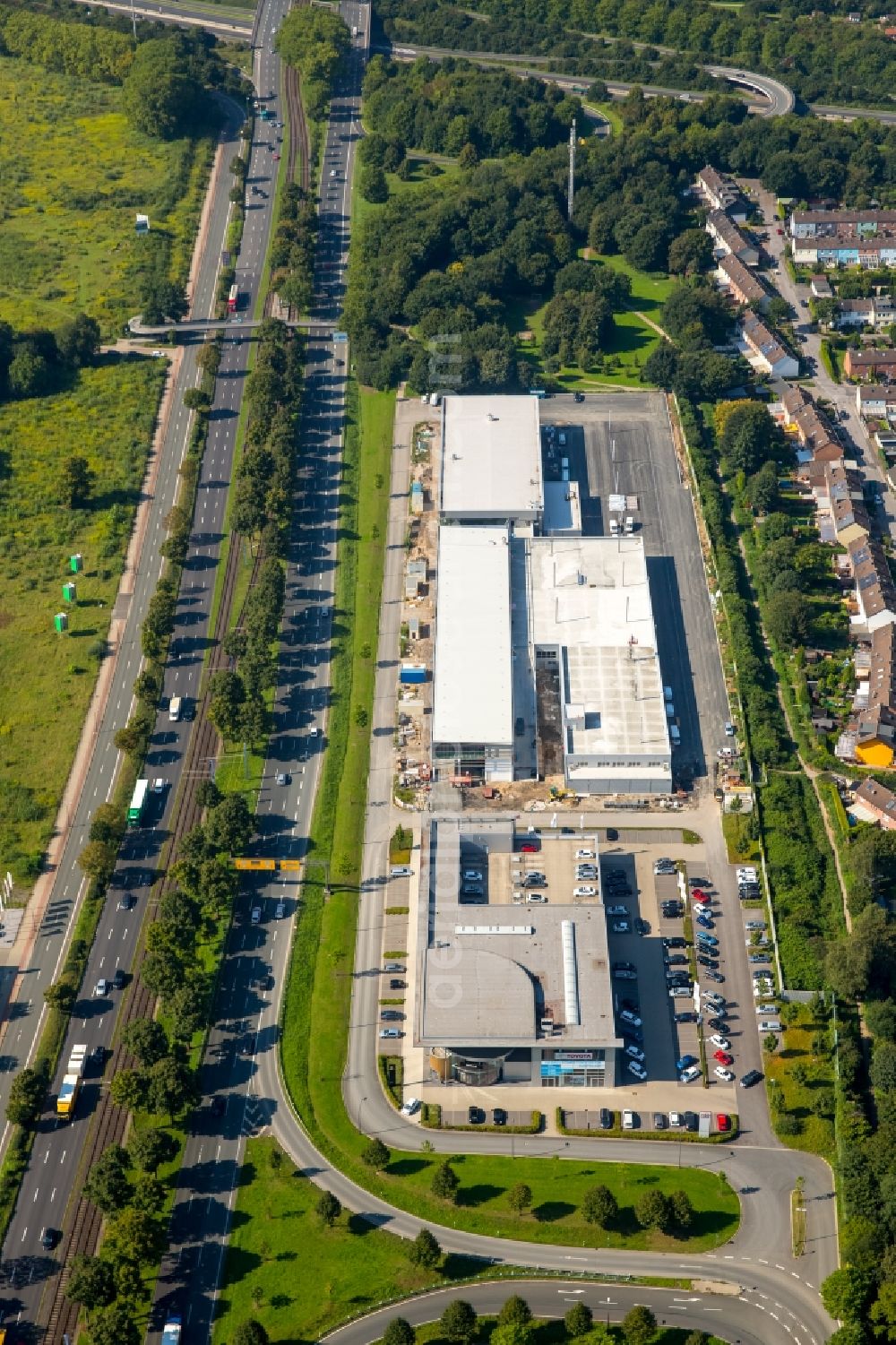 Dortmund from above - Industrial estate and company settlement on federal highway B1 in Dortmund in the state of North Rhine-Westphalia. The area is being finished, a car dealership is in place