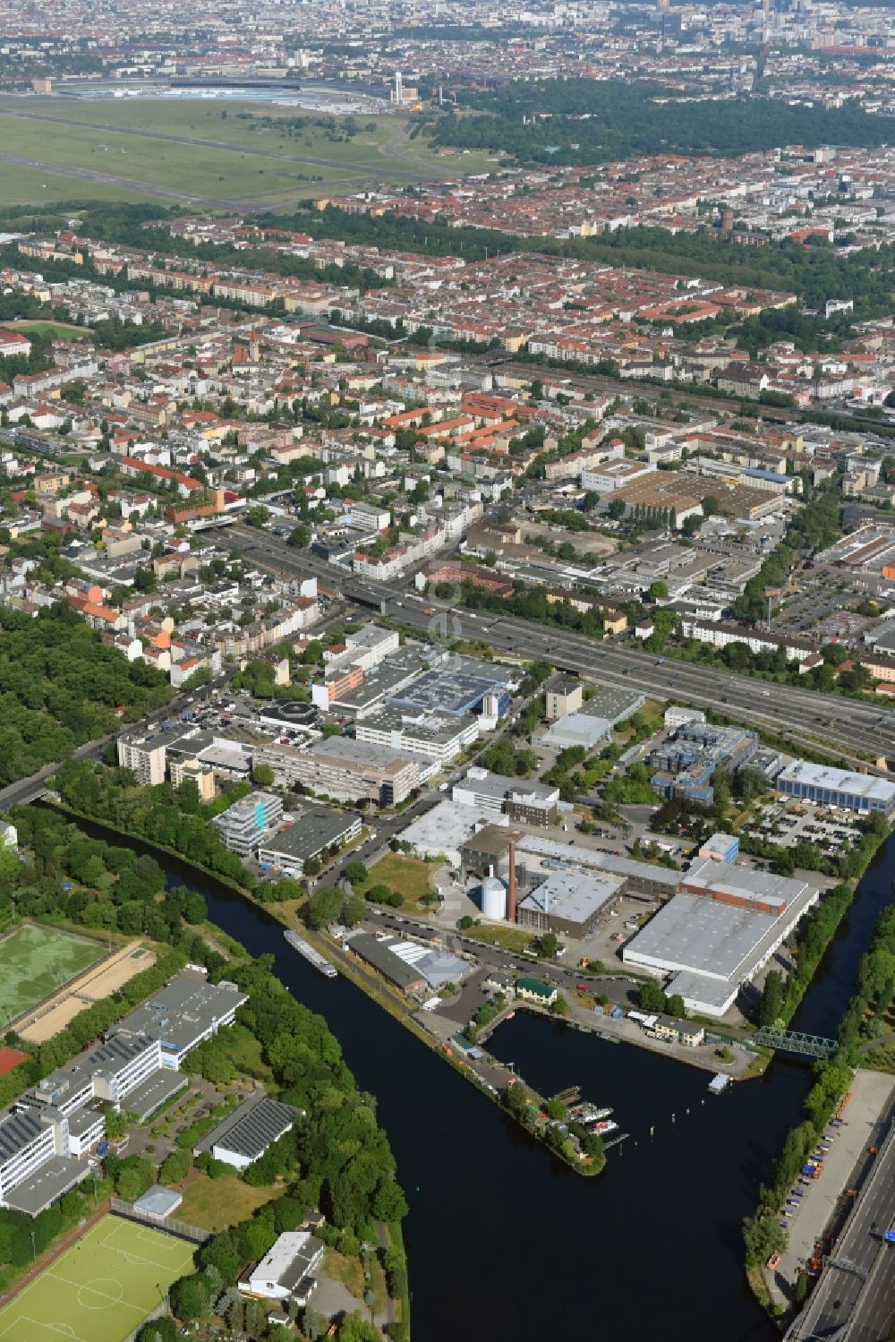 Berlin from above - Industrial estate and company settlement Buschkrugallee - Grenzallee in the district Neukoelln in Berlin, Germany