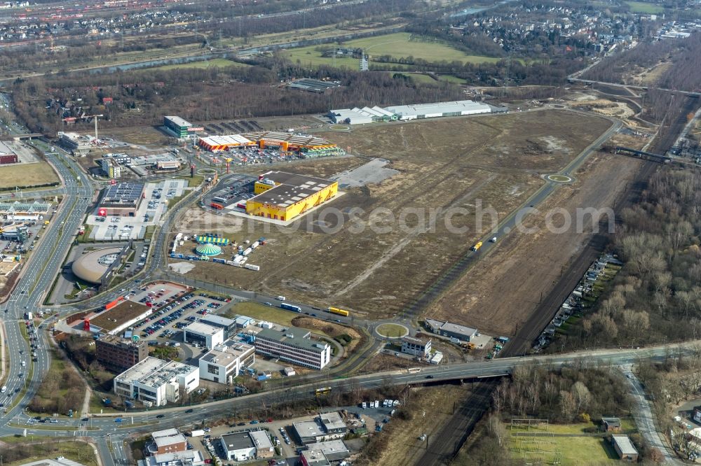 Oberhausen from above - Industrial estate BusinessPark.O with company settlement of Hornbach Oberhausen, Gartencenter Landgard, Blumengeschaeft Heinz Hartmann GmbH, engelbert strauss GmbH & Co. KG with the construction of a new branch on the former steelworks site Gutehoffnungshuette in Oberhausen in the state North Rhine-Westphalia, Germany