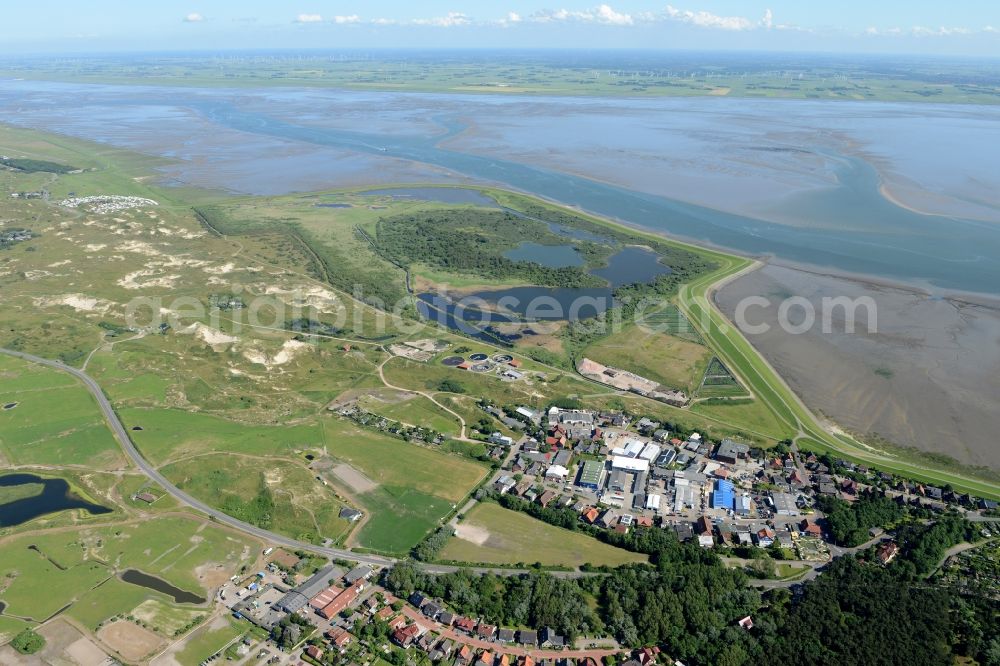 Norderney from the bird's eye view: Industrial estate, company settlement and dune landscape on North Sea- island Norderney in the state Lower Saxony