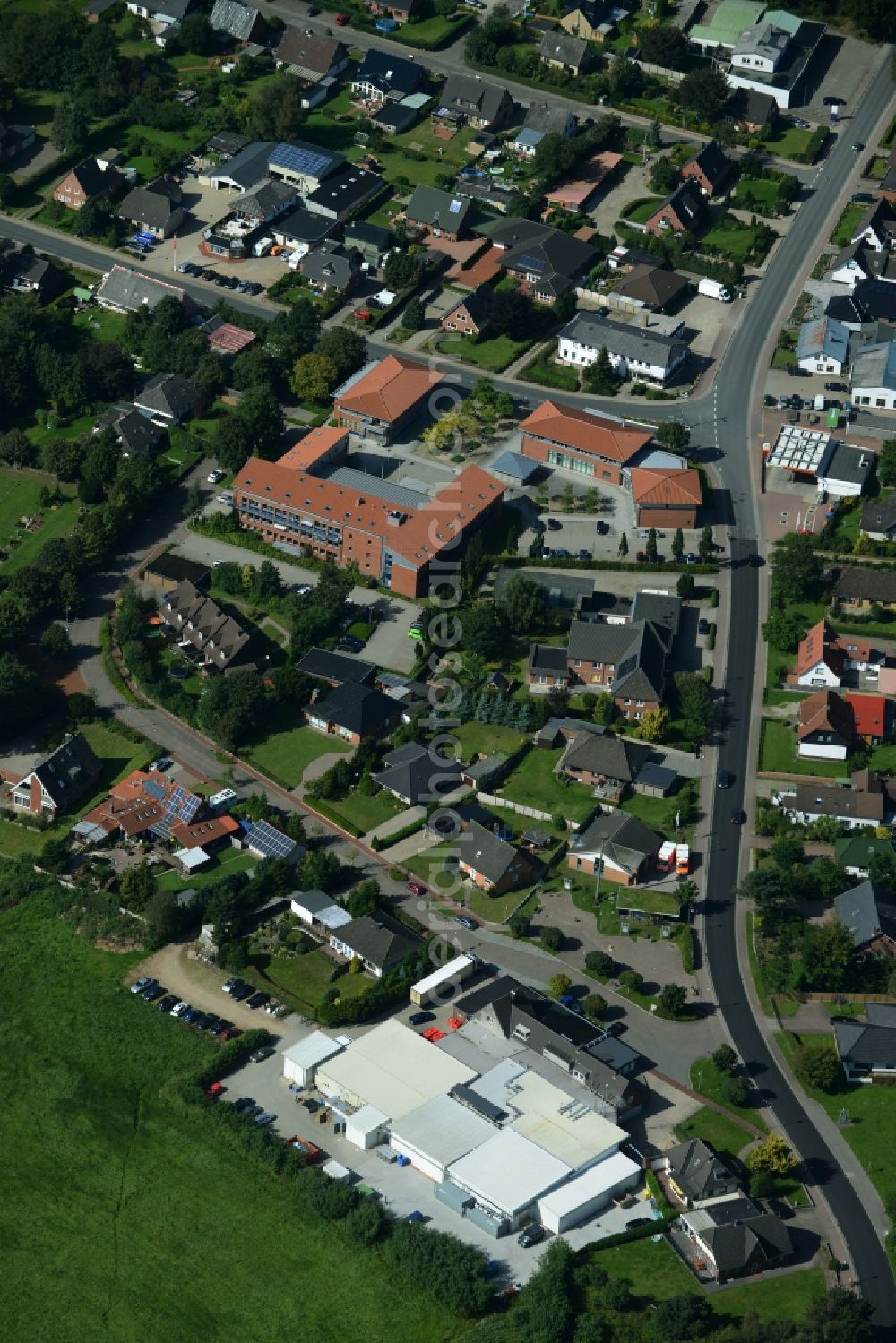 Eggebek from the bird's eye view: Commercial area and business establishment of Hoppe Fleischwaren GmbH in Eggebek in Schleswig-Holstein