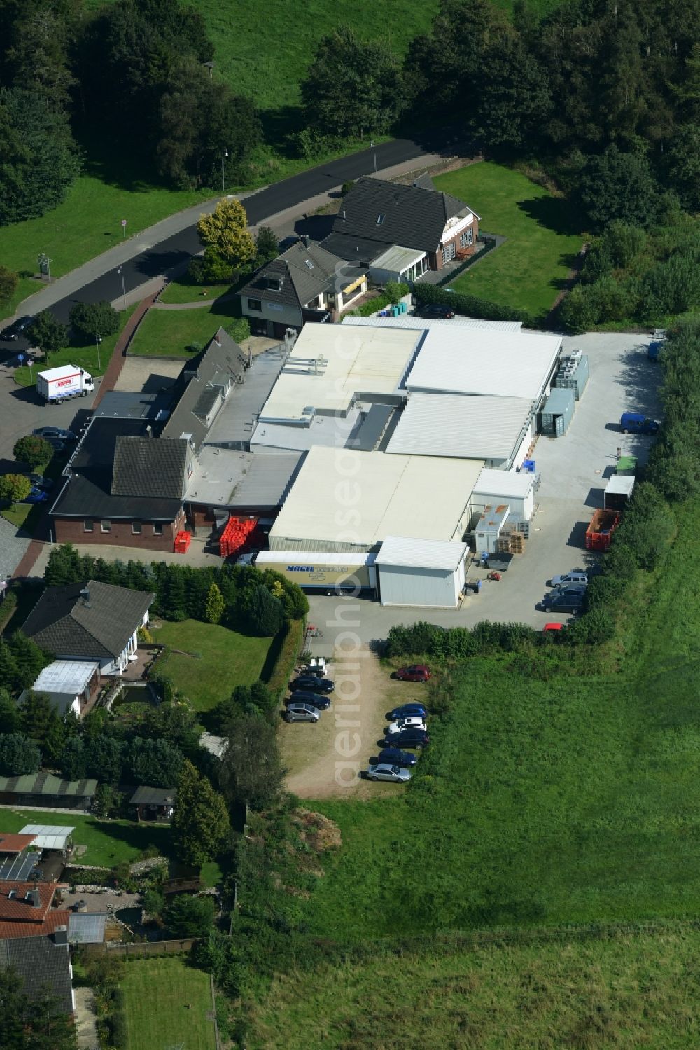 Eggebek from the bird's eye view: Commercial area and business establishment of Hoppe Fleischwaren GmbH in Eggebek in Schleswig-Holstein