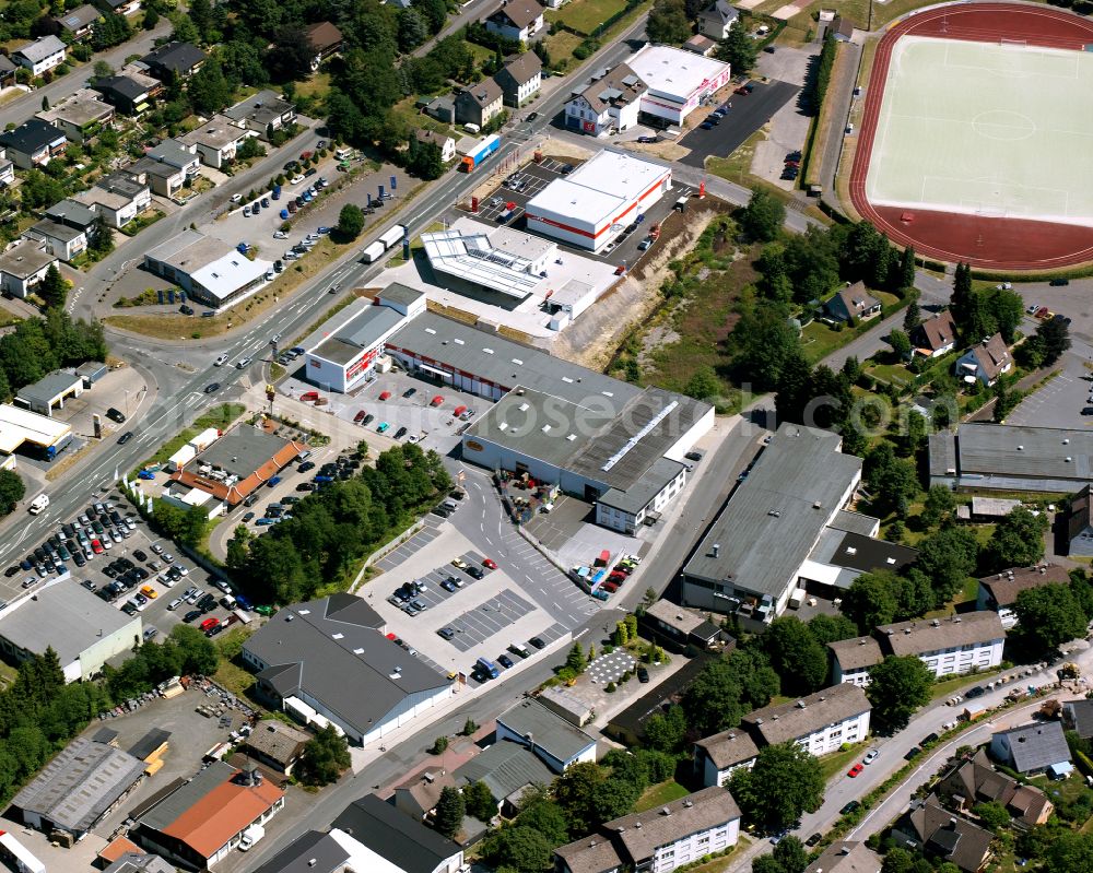 Aerial image Meinerzhagen - Industrial estate and company settlement with shopping center on street Immecker Strasse in Meinerzhagen in the state North Rhine-Westphalia, Germany