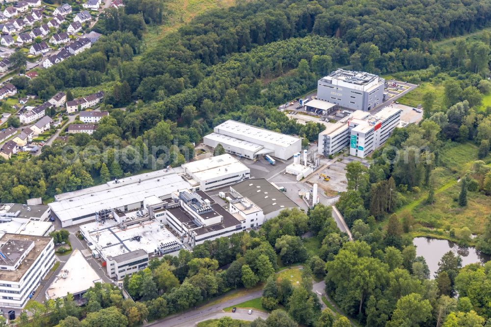 Aerial photograph Warstein - Commercial area and business establishment at the Emil-Siepmann-street in Warstein in North Rhine-Westphalia. Here sits et al the semiconductor business of Infineon Technologies AG Warstein, the AEG Power Solutions GmbH and the Siepmann - works GmbH & Co KG