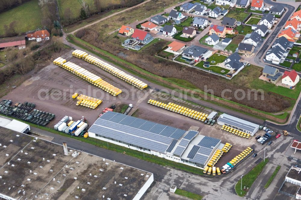 Rohrbach from the bird's eye view: Industrial estate and company settlement Sued with Engel & Engel GmbH DHL-Paket-Transporter-Verwertung in Rohrbach in the state Rhineland-Palatinate, Germany