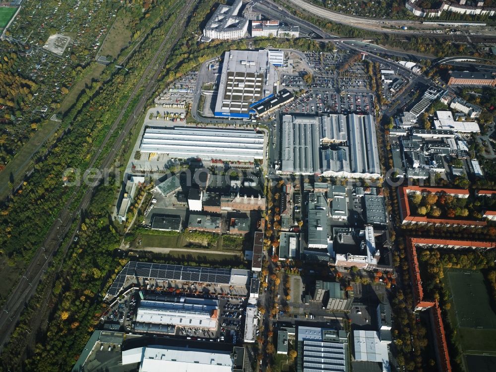 Berlin from the bird's eye view: Industrial estate and company settlement on Bessemerstrasse and Alboinstrasse in Berlin in Germany. The commercial area in the North of Alboinplatz square includes supermarkets, grocery stores, furniture stores and office buildings located in old factories. An IKEA furniture store is located in the North of the area