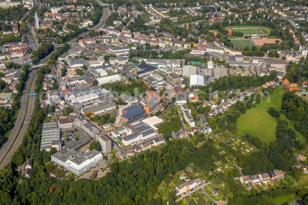 Essen from the bird's eye view: Industrial estate and company settlement along the Bundesautobahn A52 - Schuermannstrasse in Essen in the state North Rhine-Westphalia, Germany