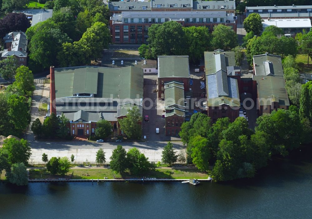 Berlin from the bird's eye view: Industrial estate and company settlement along the Eiswerderstrasse in the district Hakenfelde in Berlin, Germany