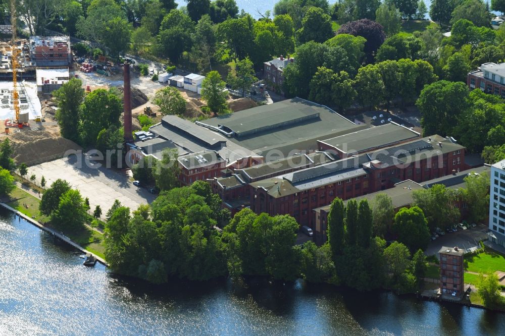 Berlin from the bird's eye view: Industrial estate and company settlement along the Eiswerderstrasse in the district Hakenfelde in Berlin, Germany