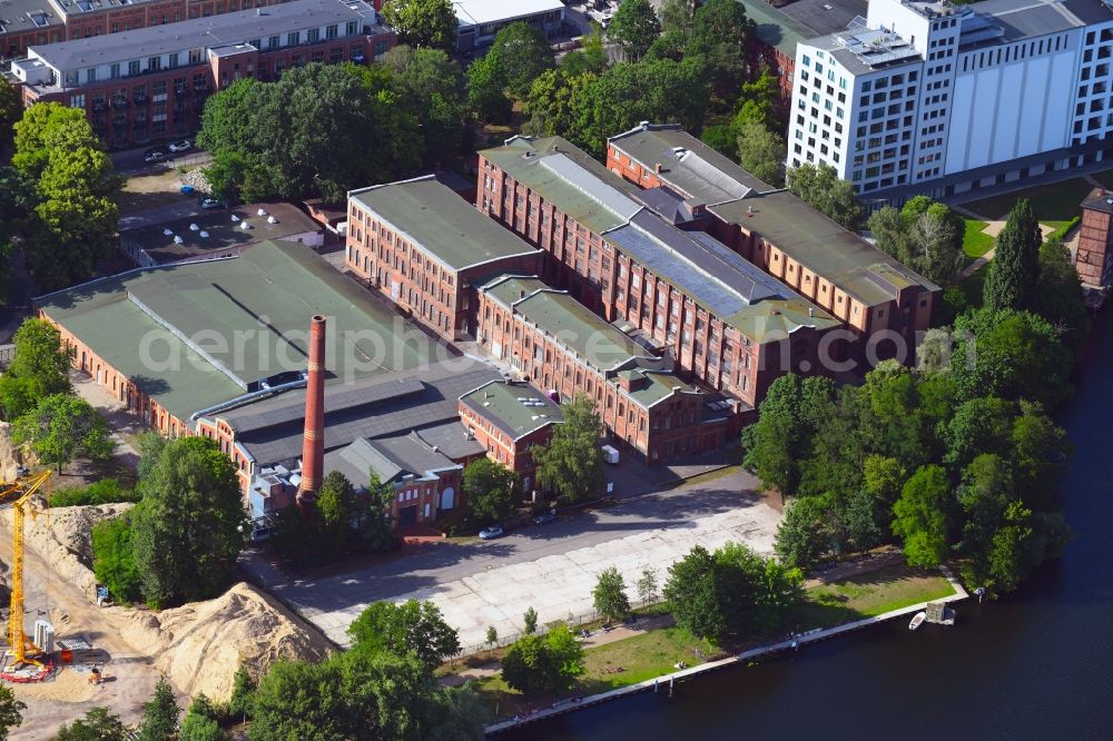 Berlin from the bird's eye view: Industrial estate and company settlement along the Eiswerderstrasse in the district Hakenfelde in Berlin, Germany