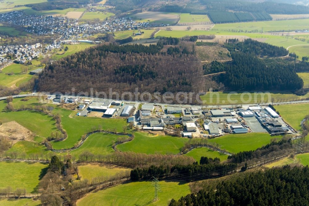 Schmallenberg from the bird's eye view: Industrial estate and company settlement along the Fleckenberger Strasse in Schmallenberg in the state North Rhine-Westphalia, Germany