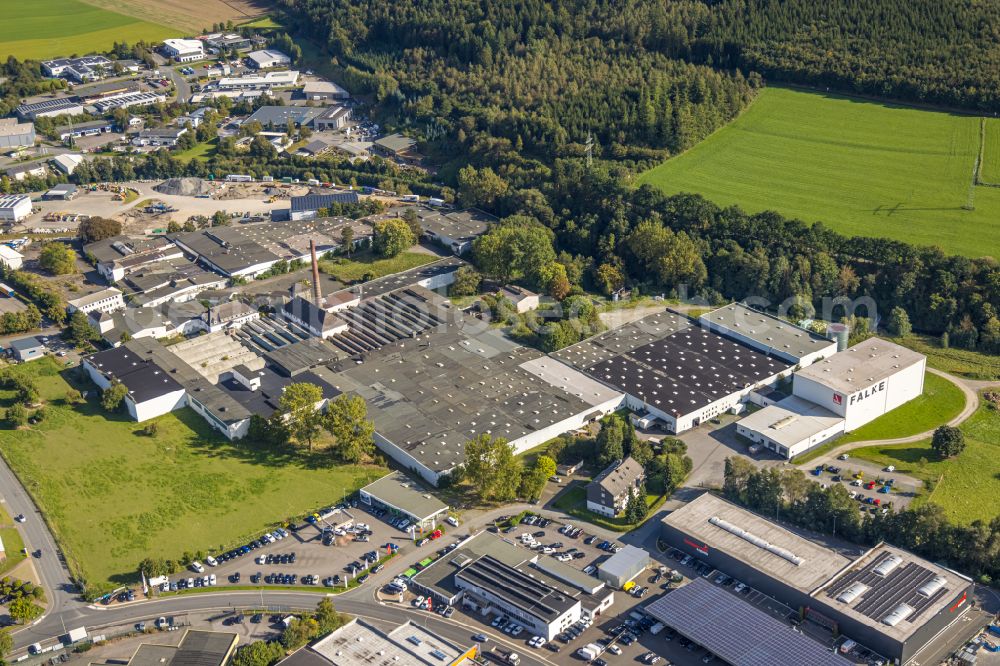 Aerial image Schmallenberg - Industrial estate and company settlement along the B236 - Auf der Lake with road maintenance works in Schmallenberg at Sauerland in the state North Rhine-Westphalia, Germany