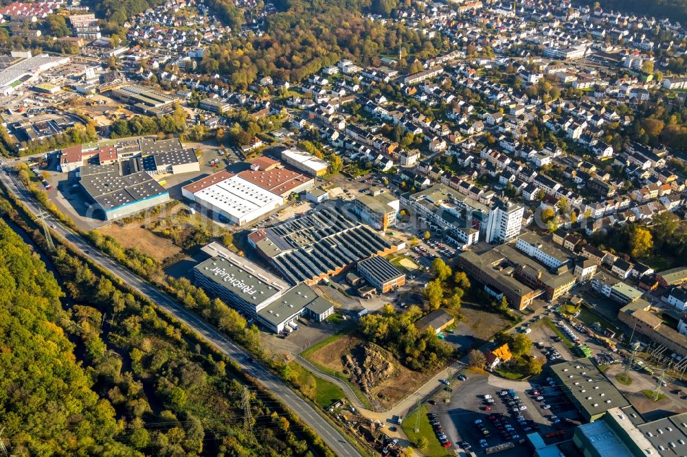 Arnsberg from above - Industrial estate and company settlement along the Moehnestrasse in the district Neheim in Arnsberg in the state North Rhine-Westphalia, Germany