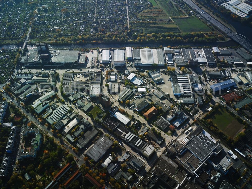 Berlin from above - Industrial estate and company settlement along Nobelstrasse in the South of the Neukoelln district in Berlin in Germany. The connection canal of Britz is taking its course in the South of the area