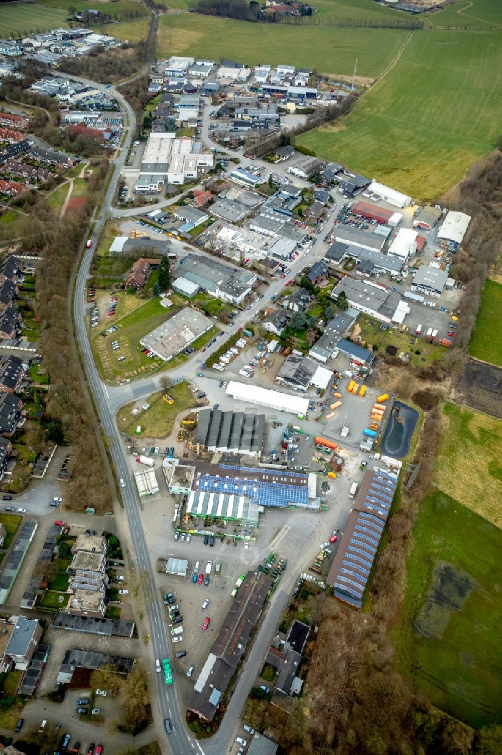 Aerial photograph Kirchhellen - Industrial estate and company settlement along the Pelsstrasse - Raiffeisenstrasse in Kirchhellen in the state North Rhine-Westphalia, Germany