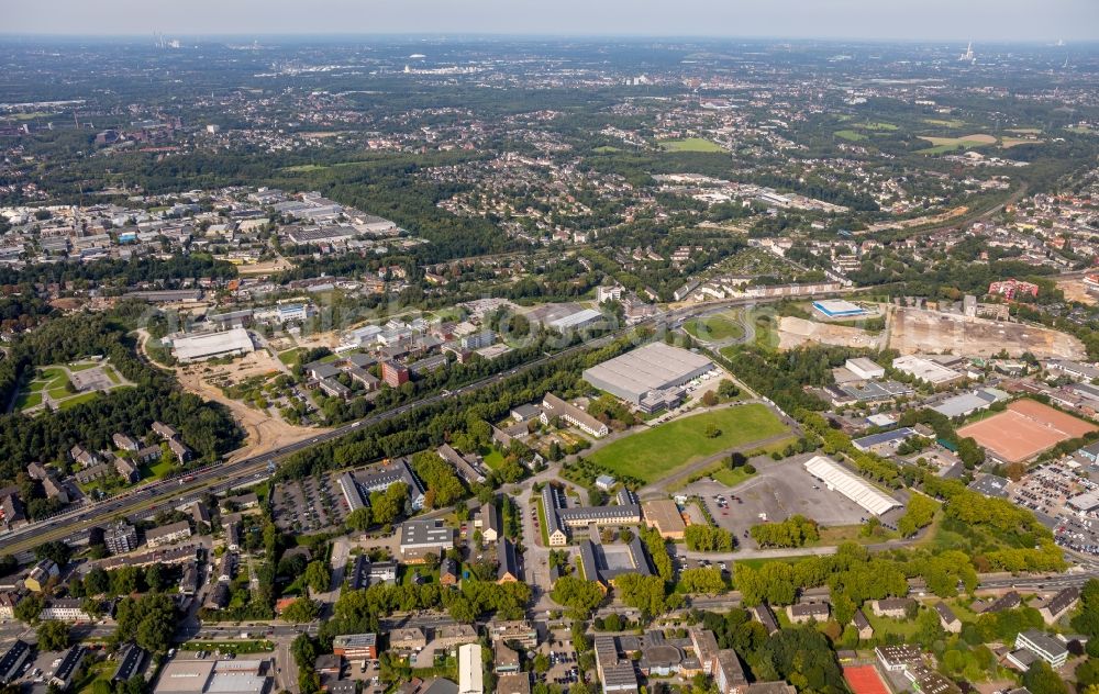 Essen from the bird's eye view: Industrial estate and company settlement along the Schoenscheidtstrasse in Essen in the state North Rhine-Westphalia, Germany