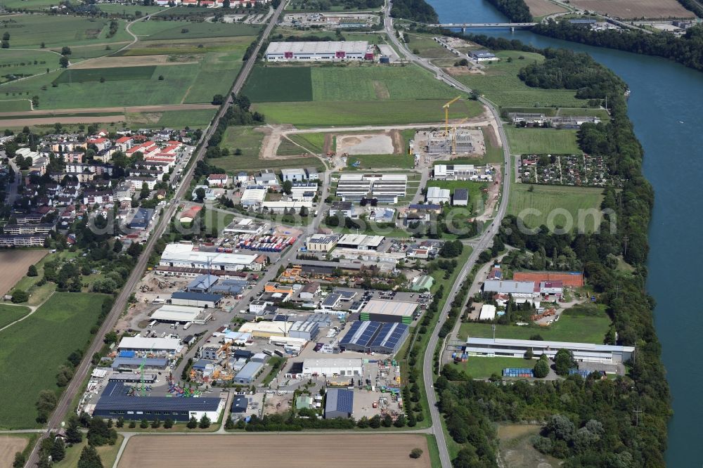 Aerial photograph Rheinfelden (Baden) - Expansion in the industrial area for the company administration building of the Pharmaceutical Company Fisher Clinical Services in the district Herten in Rheinfelden (Baden) in the state Baden-Wurttemberg, Germany