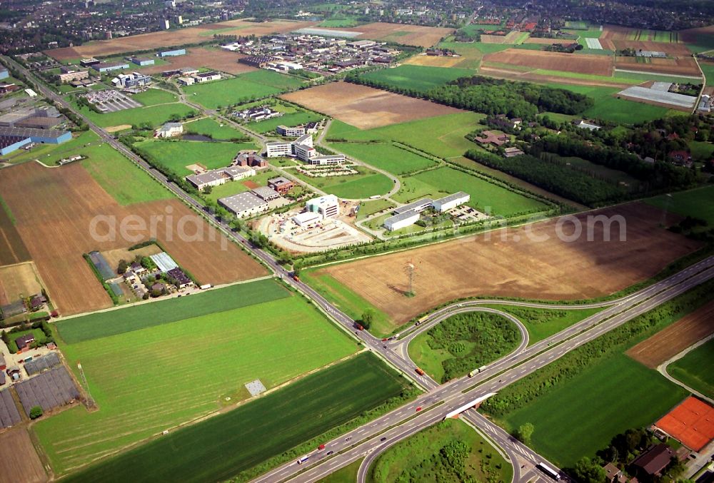 Aerial photograph Krefeld - Industrial park Europa Park at the motorway exit of the motorway A4 Fichtenhain in Krefeld in North Rhine-Westphalia