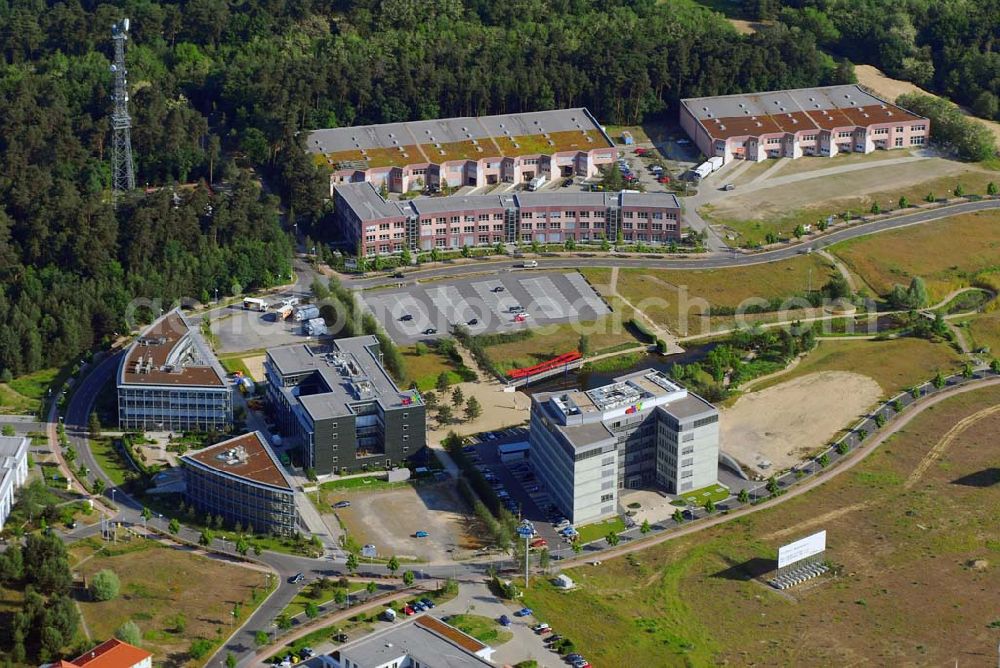 Kleinmachnow from the bird's eye view: Blick auf das Gewerbegebiet Europark Dreilinden bei Kleinmachnow. Das Gewerbegebiet Europark wurde nach der Wende auf dem Gelände der ehemaligen Autobahn-Kontrollstelle Dreilinden errichtet. Heute sind dort Unternehmen wie das Achim Walder Auktionshaus ebay tätig.