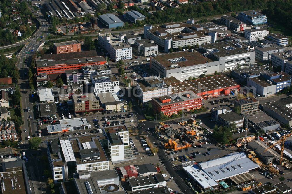 Reinach from the bird's eye view: Company grounds and buildings in the industrial area in Reinach in Basel-Landschaft, Switzerland