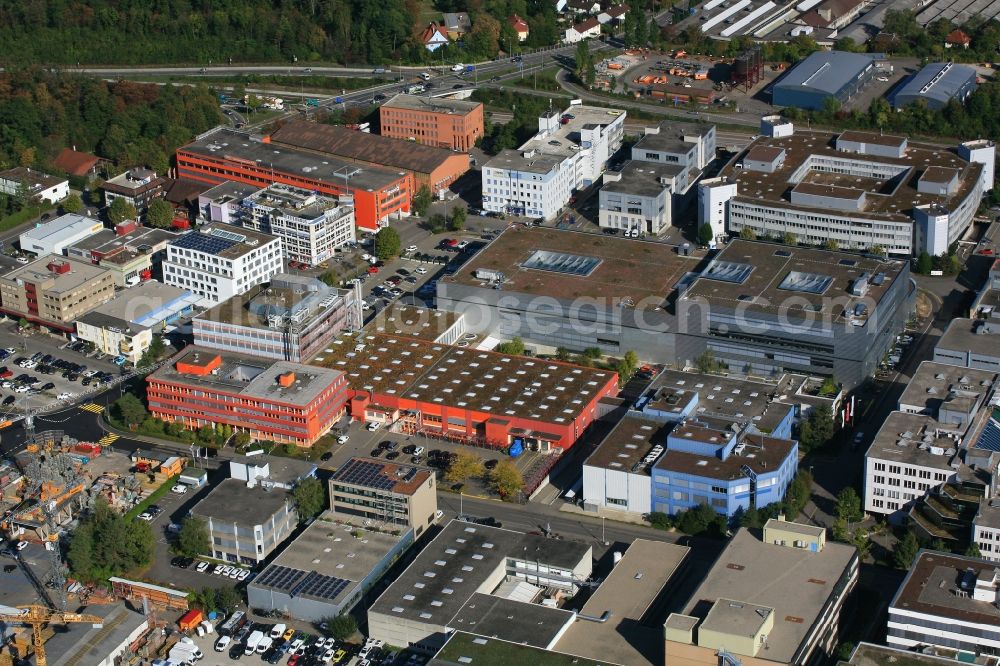 Reinach from above - Company grounds and buildings in the industrial area in Reinach in Basel-Landschaft, Switzerland