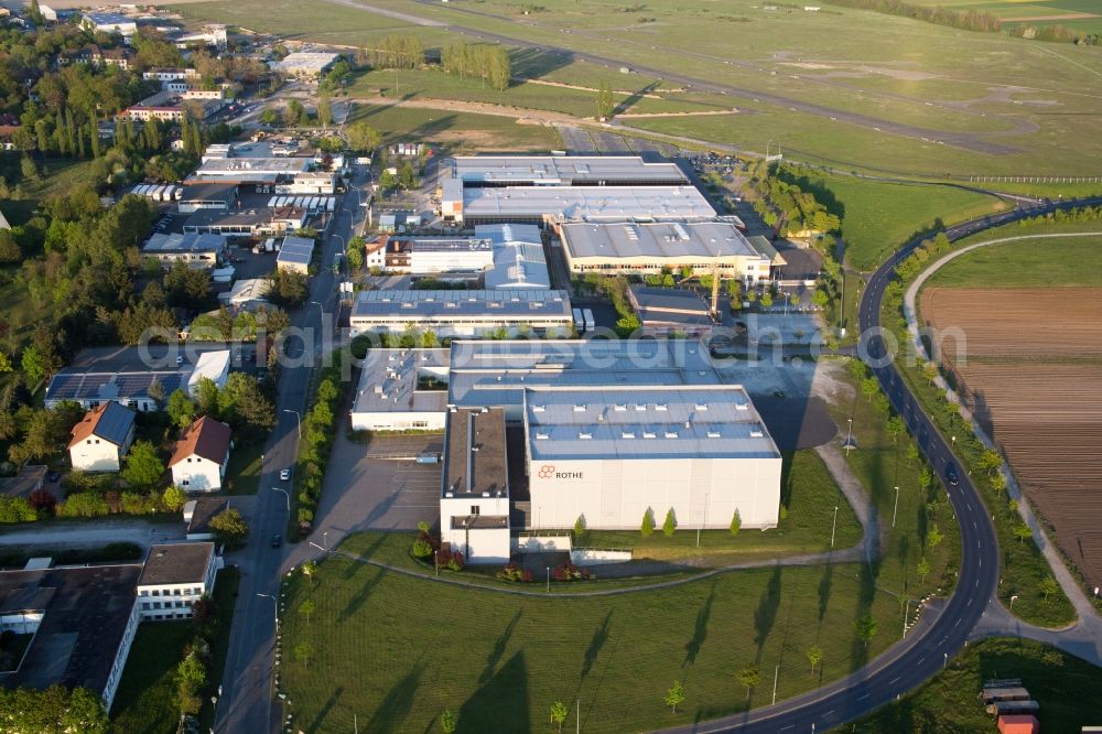 Kitzingen from the bird's eye view: Industrial estate and company settlement Flugplatzstrasse in the district Etwashausen in Kitzingen in the state Bavaria, Germany