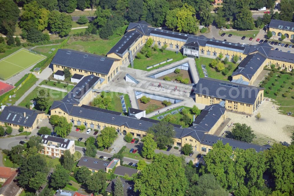 Potsdam from above - View at the multifunctional area Guard Uhlans barracks in the Jägervorstadt in Potsdam in the federal state of Brandenburg. The after the reunion reconstructed former barracks are now used as a commercial area and includes the Oberstufenzentrum OSZ I Technology, the Business School Potsdam and various companies. It is monumental protected