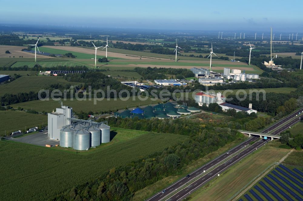 Gerdshagen from the bird's eye view: Commercial area in Gerdshagen in Brandenburg. Directly at the motorway BAB A24 - E26 preferred forage silos ForFarmers Bm GmbH and equipment gbf German biofuels gmbh