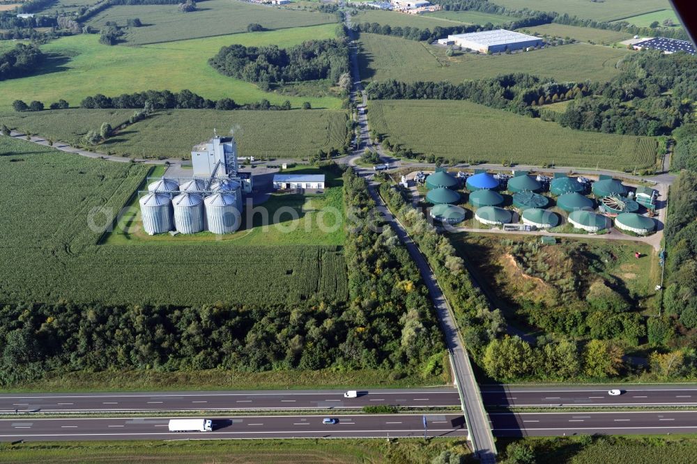 Aerial photograph Gerdshagen - Commercial area in Gerdshagen in Brandenburg. Directly at the motorway BAB A24 - E26 preferred forage silos ForFarmers Bm GmbH and equipment gbf German biofuels gmbh