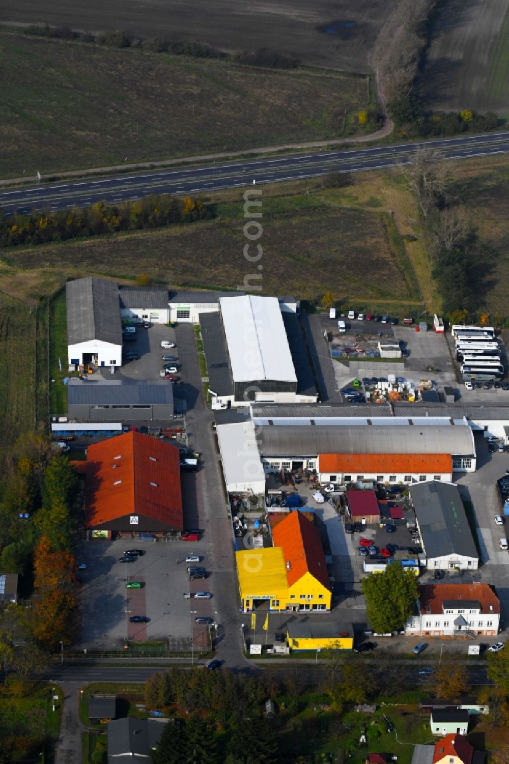 Oranienburg from the bird's eye view: Industrial estate and company settlement Germendorfer Allee in the district Eden in Oranienburg in the state Brandenburg, Germany