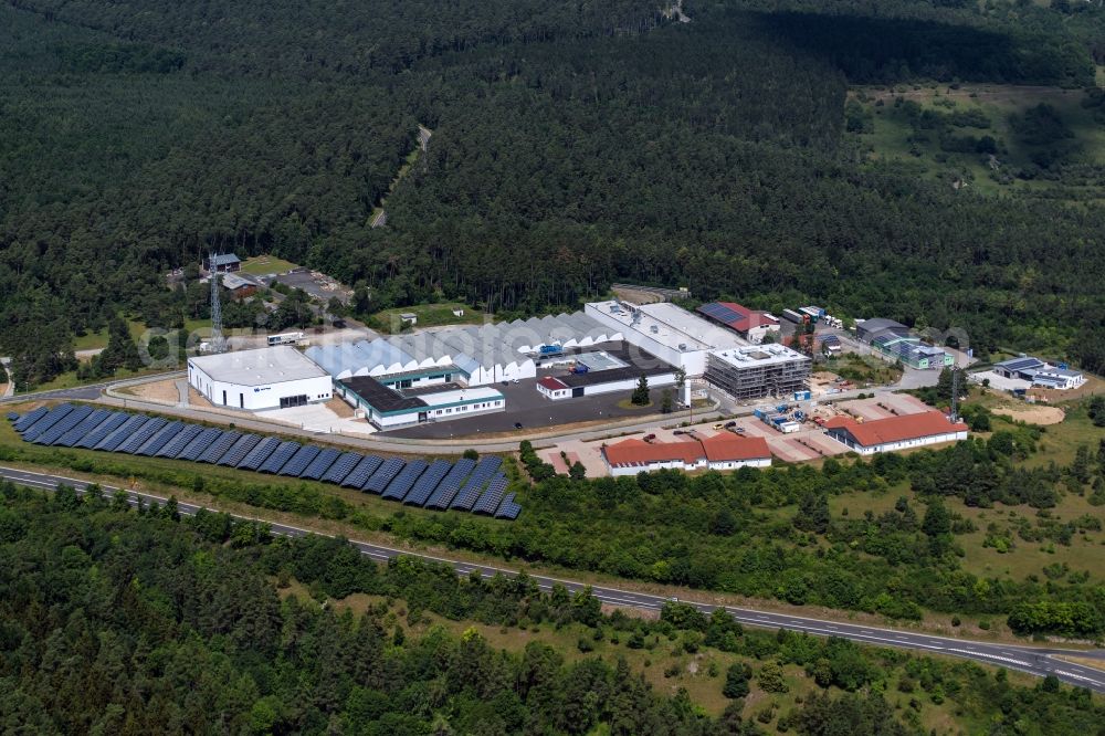 Münnerstadt from the bird's eye view: Industrial estate and company settlement Gewerbegebiet Schindberg 1 in Muennerstadt in the state Bavaria, Germany