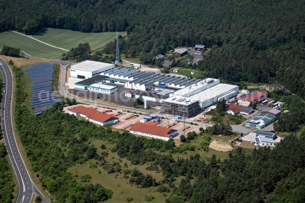 Aerial image Münnerstadt - Industrial estate and company settlement Gewerbegebiet Schindberg 1 in Muennerstadt in the state Bavaria, Germany