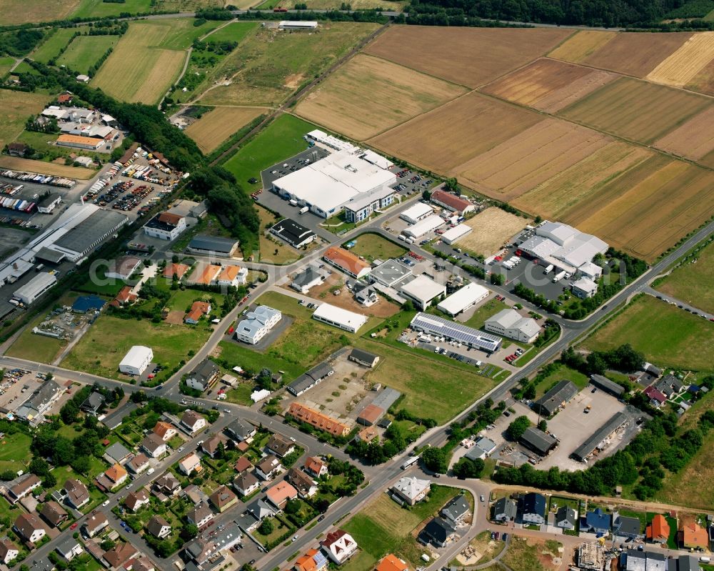 Aerial photograph Lich - Industrial estate and company settlement on Gottlieb-Daimler-Strasse in Lich in the state Hesse, Germany