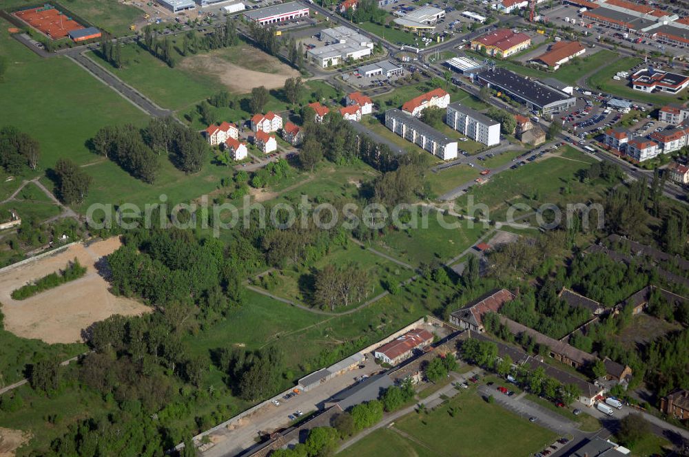 Aerial image Grimma - Blick auf das Gewerbegebiet in Grimma. Dort sind beispielsweise einige Gewerbe vertreten wie Panda Möbel Grimma GmbH, Möbelhaus Friedrich GmbH, Aldi-Nord Filiale, Prima Einkaufs-Park (PEP) Grimma. Kontakt: Stadtverwaltung Grimma, Markt 16/ 17, 04668 Grimma, Tel. +49(0)3437 9858 0, Fax +49(0)3437 9858 226, Email: info@grimma.de