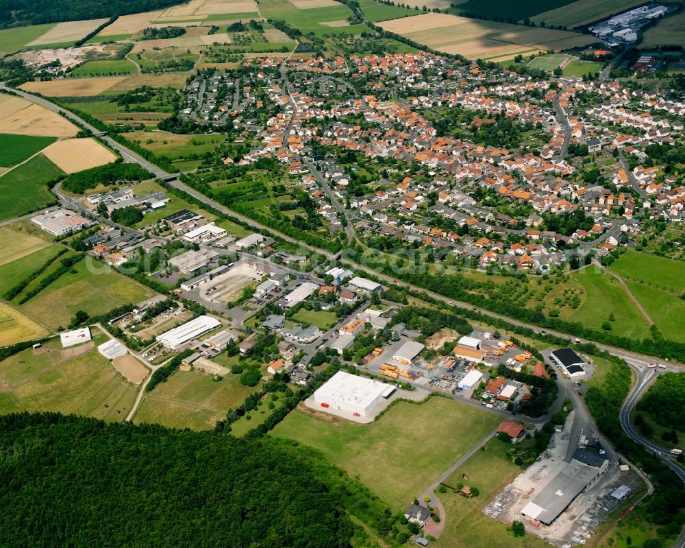 Fernwald from the bird's eye view: Industrial estate and company settlement on Gutenbergring in Fernwald in the state Hesse, Germany