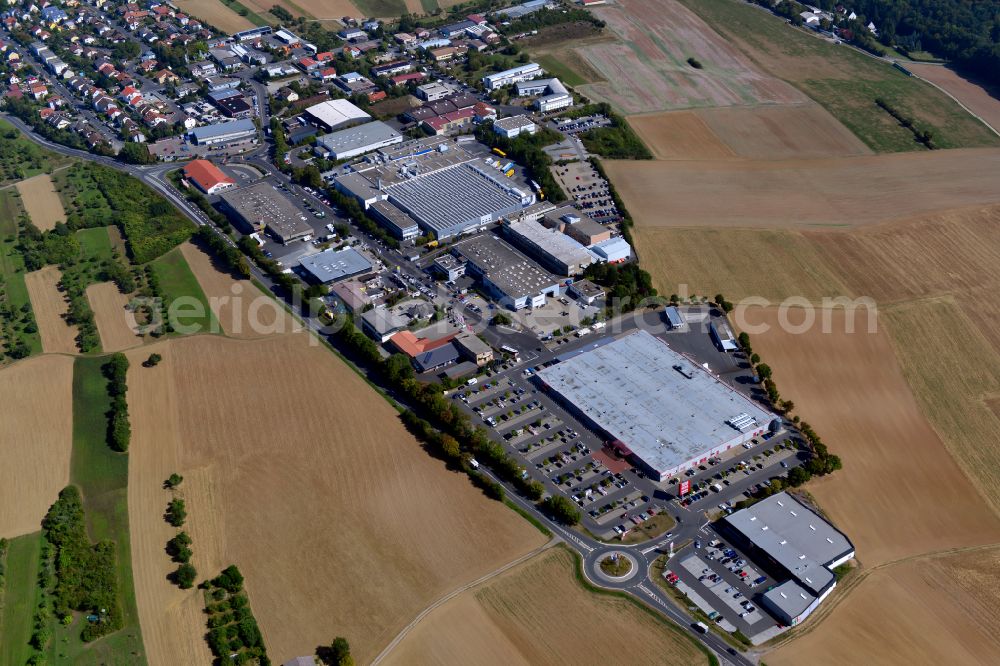 Aerial photograph Höchberg - Industrial estate and company settlement on street Leibnizstrasse in Hoechberg in the state Bavaria, Germany