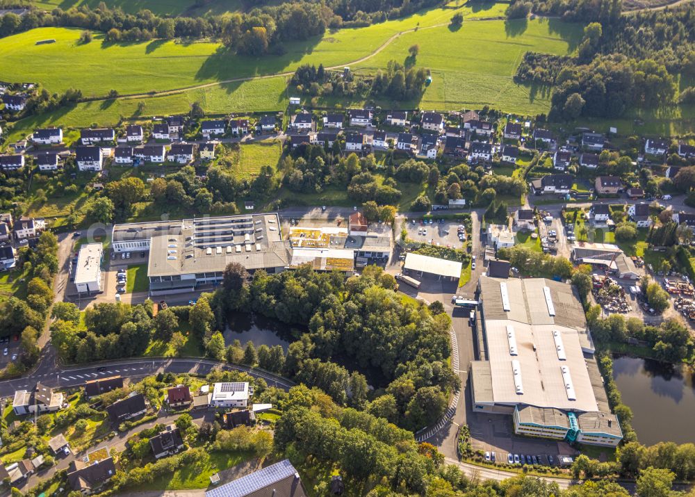 Hilchenbach from above - Industrial estate and company settlement on street Wilhelm-Muenker-Strasse in Hilchenbach at Siegerland in the state North Rhine-Westphalia, Germany