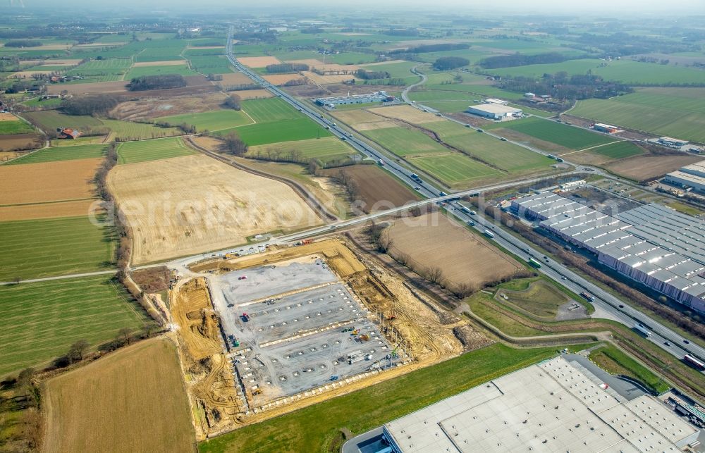 Aerial photograph Bönen - Industrial area Inlog-Park along the federal motorway and surrounding area of the A2 in the West of the Rhynern part of Hamm in the state of North Rhine-Westphalia