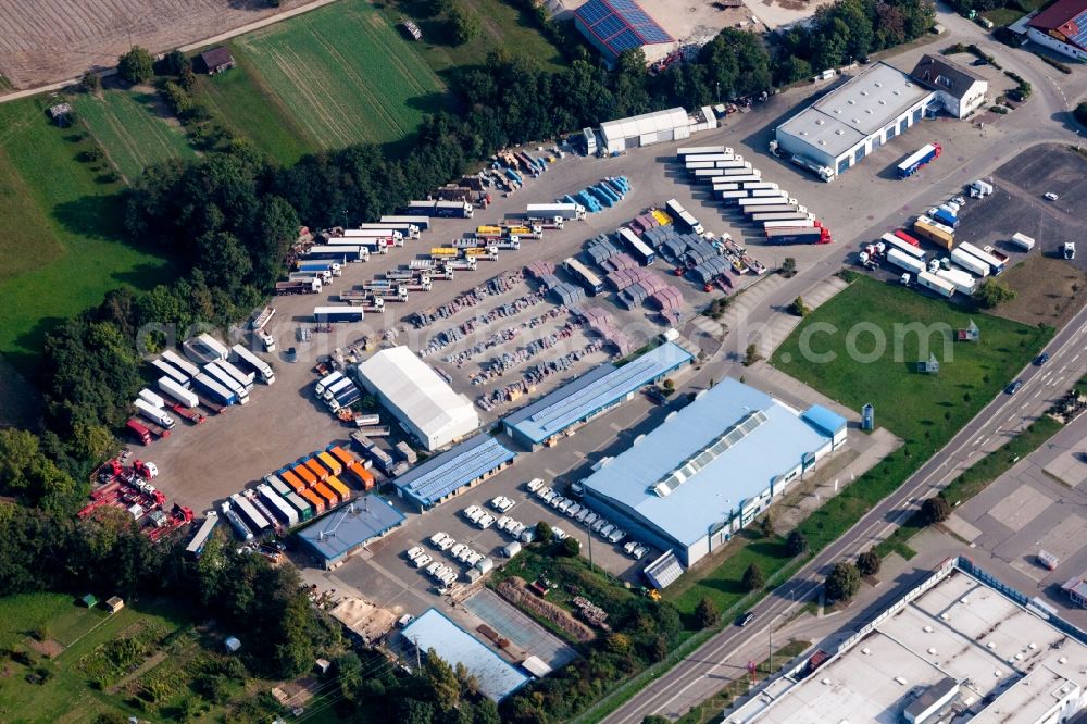 Östringen from the bird's eye view: Industrial estate and company settlement Justus von Liebig Strasse with R + K Nutzfahrzeugservice and Essenpreis Haustechnik GmbH in Oestringen in the state Baden-Wuerttemberg, Germany