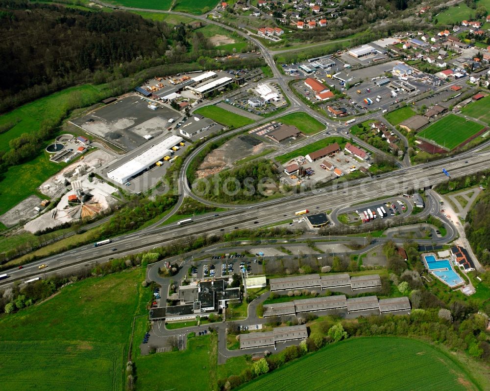 Kirchheim from above - Industrial estate and company settlement in Kirchheim on the highway A7 in the state Hesse, Germany