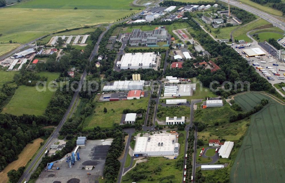 Krauthausen from the bird's eye view: In unmittelbarer Nähe zur Bundesaustobahn A4 bei Krauthausen im Bundesland Thüringen befindet sich ein großflächiges Gewerbegebiet. Hier haben unter an derem die Automobilzulieferer BMW Fahrzeugtechnik GmbH und MITEC Automotive AG ihre Produktionsstätten. //In close proximity to the A4 at Bundesaustobahn Krauthausen in Thuringia is a large-scale commercial area. Among other things, the automotive vehicle BMW Technik GmbH and MiTeC Automotive AG have their production facilities