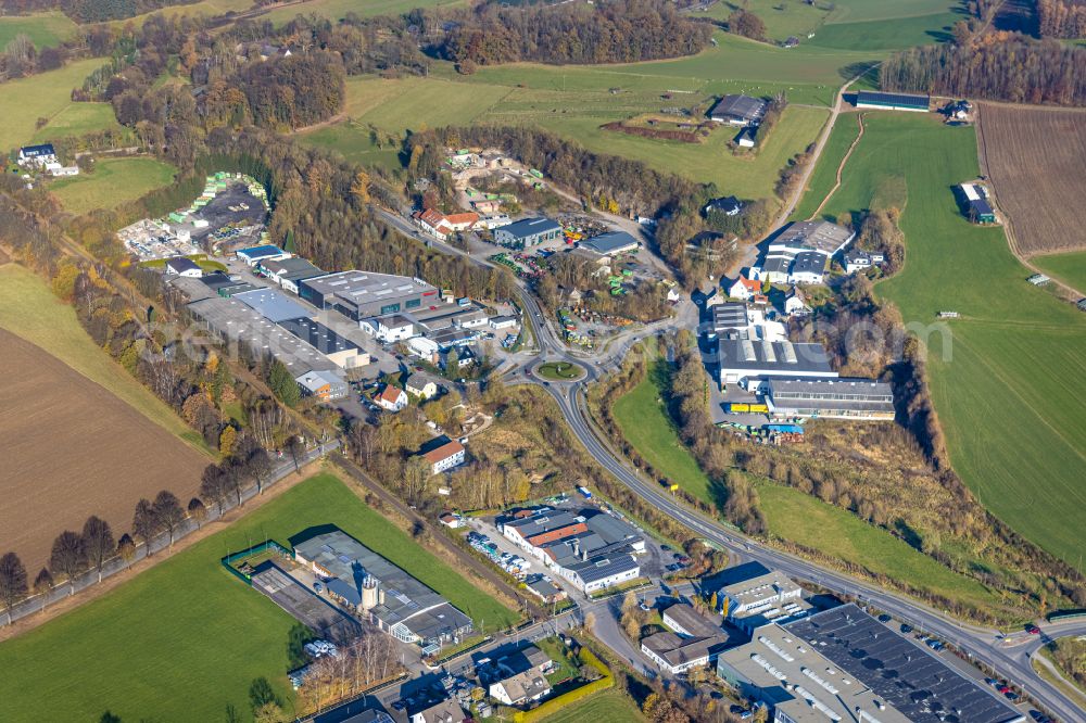 Balve from the bird's eye view: Industrial estate and company settlement at the roundabout - the course of the road Am Pickhammer - Langenholthauser Strasse in the district Garbecker Hammer in Balve in the state North Rhine-Westphalia, Germany