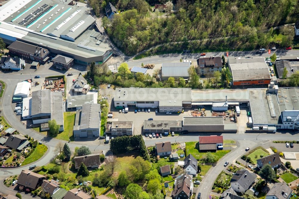 Netphen from the bird's eye view: Industrial estate and company settlement on Kreuztaler Strasse in the district Dreis-Tiefenbach in Netphen in the state North Rhine-Westphalia, Germany