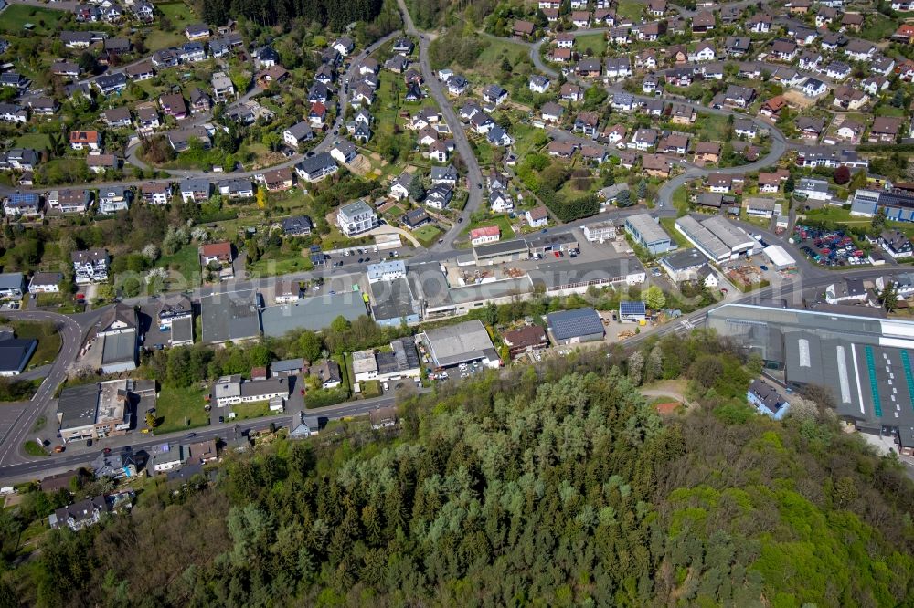 Netphen from the bird's eye view: Industrial estate and company settlement on Kreuztaler Strasse in the district Dreis-Tiefenbach in Netphen in the state North Rhine-Westphalia, Germany