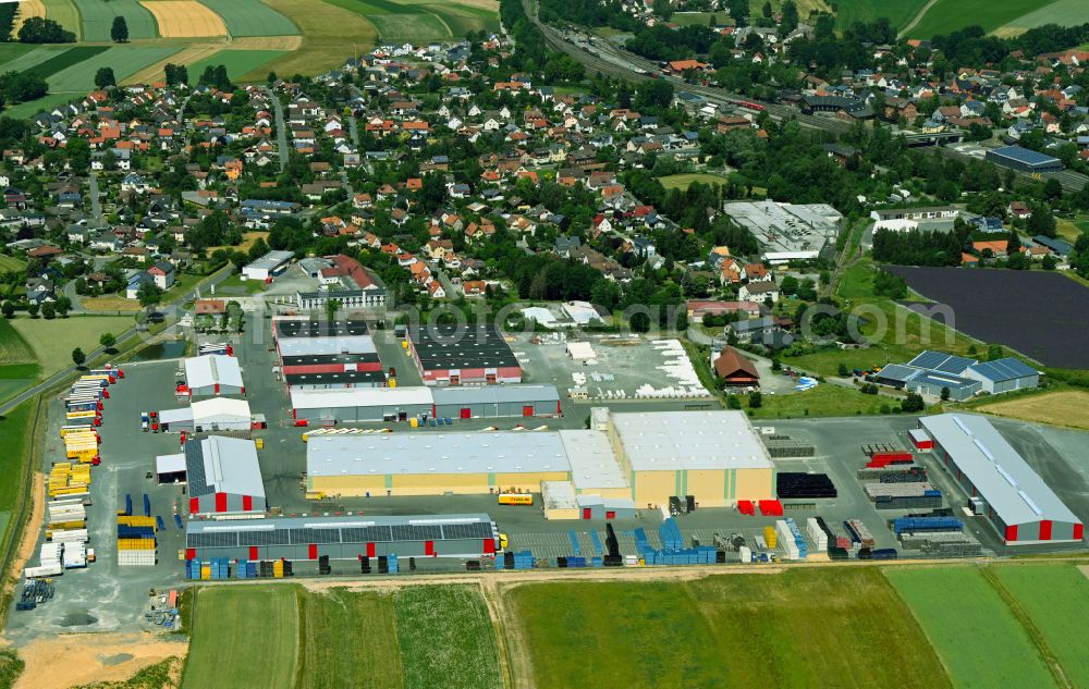 Aerial image Neuenmarkt - Industrial estate and company settlement with a logistic center on street Neue Siedlung in the district Hegnabrunn in Neuenmarkt in the state Bavaria, Germany