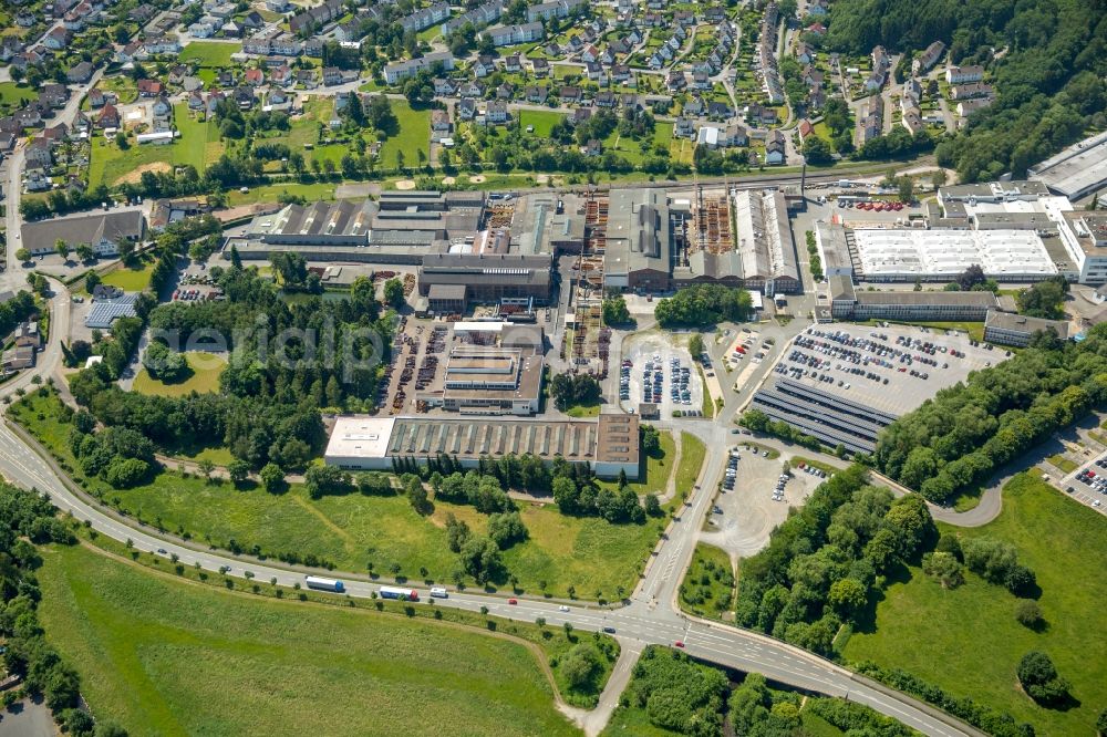 Aerial photograph Warstein - Commercial area and business establishment at the Max-Planck-Strasse in Warstein in North Rhine-Westphalia. Here sits et al the semiconductor business of Infineon Technologies AG Warstein, the AEG Power Solutions GmbH and the Siepmann - works GmbH & Co KG