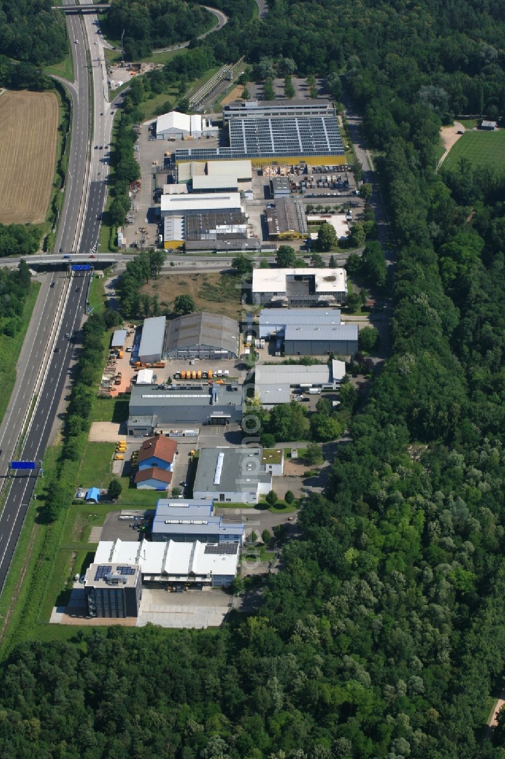 Aerial image Weil am Rhein - Industrial estate and company settlements in the district Maerkt beside the motorway BAB A5 in Weil am Rhein in the state Baden-Wurttemberg, Germany