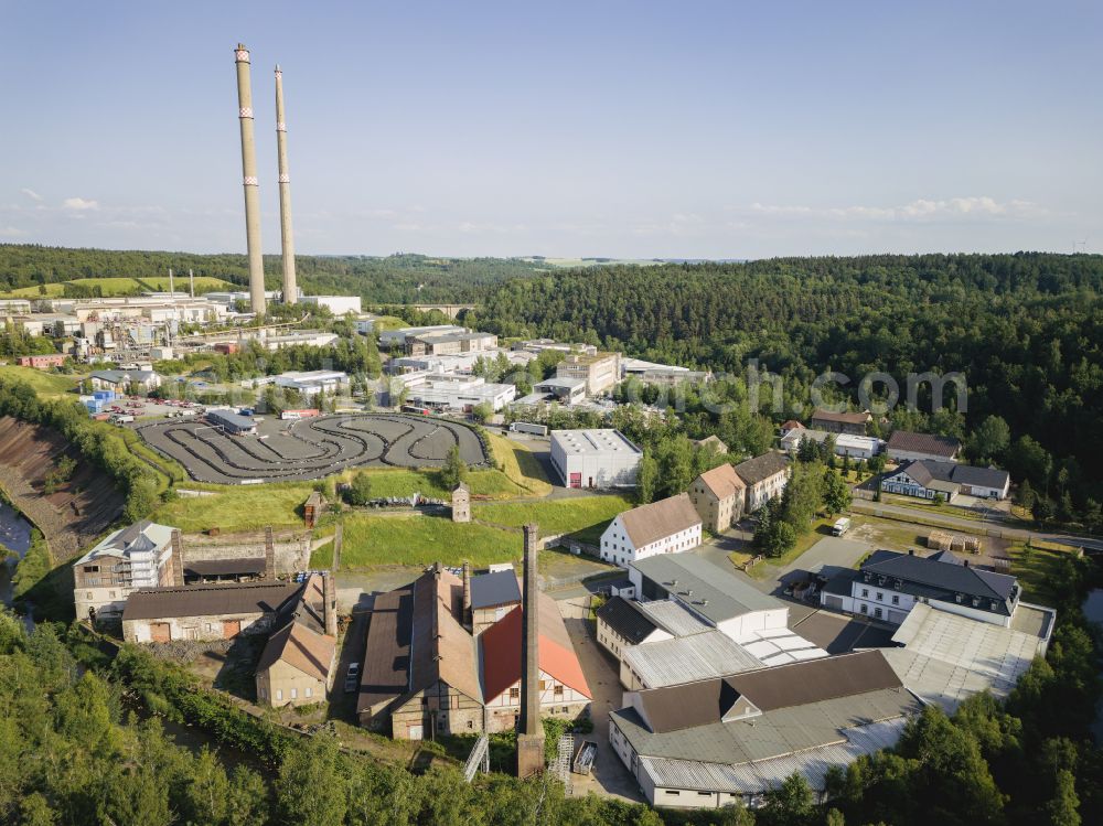 Aerial photograph Freiberg - Muldenhuetten is an industrial area that has been part of Freiberg since January 1, 2012. It is located directly on the right bank of the Freiberger Mulde. The town has been shaped by metallurgy for almost 700 years, in Freiberg in the state of Saxony, Germany